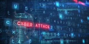 the word cyber attack written in red on a dark background