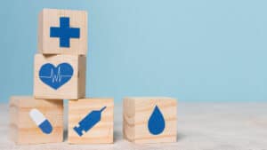 wooden blocks with blue stickers on them